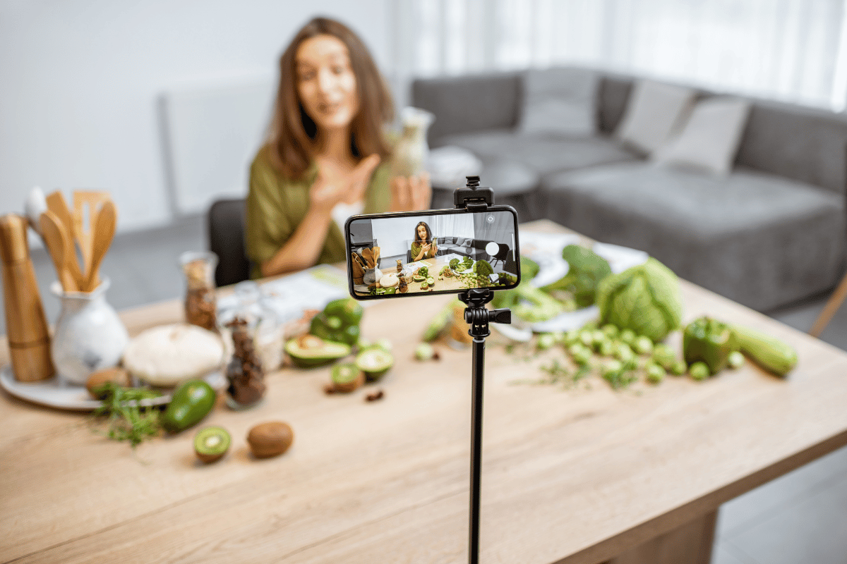 Woman recording a video to promote content and reach her audience