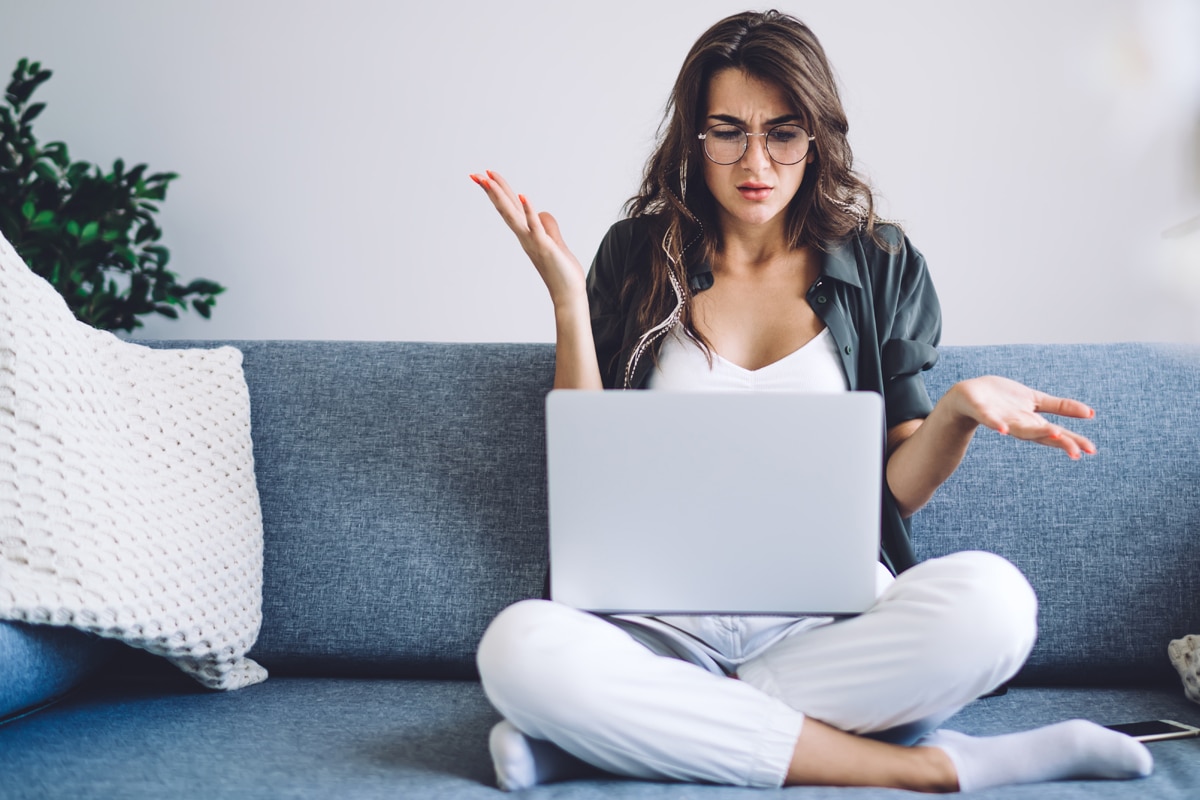 Business owner frustrated while planning her website service pages.